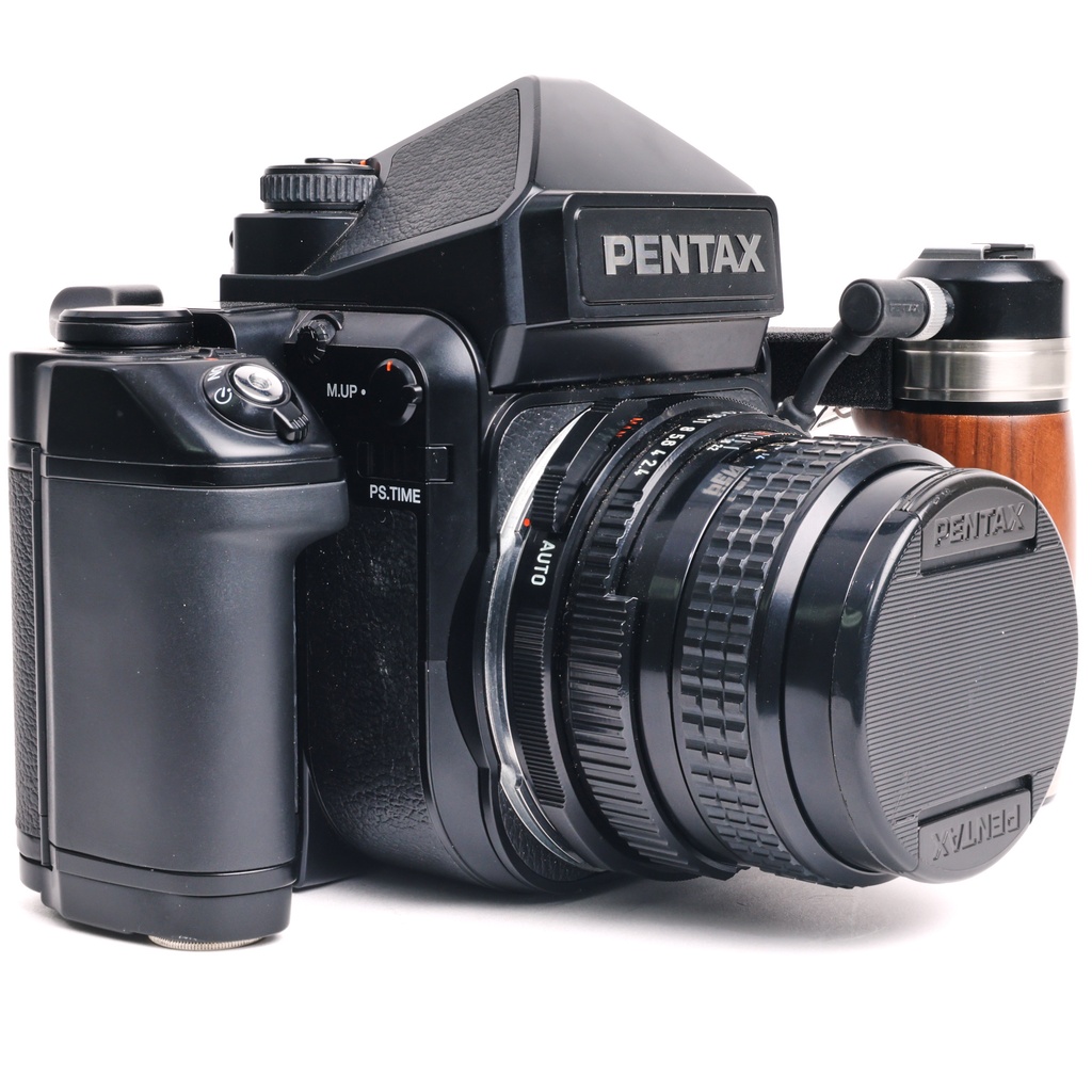 Pentax 67 II body w/- wooden grip + original strap + 105mm f/2.4 Grade 9