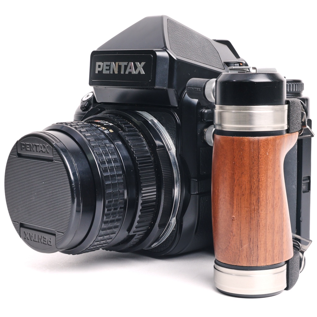 Pentax 67 II body w/- wooden grip + original strap + 105mm f/2.4 Grade 9