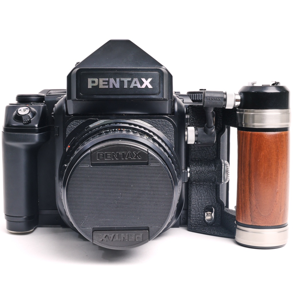 Pentax 67 II body w/- wooden grip + original strap + 105mm f/2.4 Grade 9